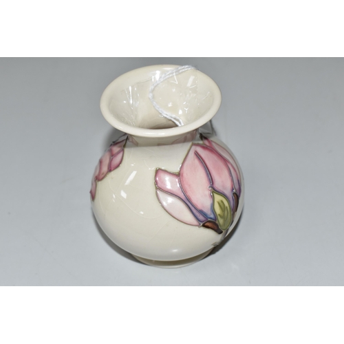 758 - A MOORCROFT POTTERY MAGNOLIA VASE, of wide necked baluster form, tube-lined with pink magnolia bloom... 