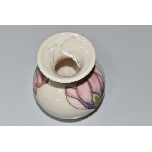 758 - A MOORCROFT POTTERY MAGNOLIA VASE, of wide necked baluster form, tube-lined with pink magnolia bloom... 