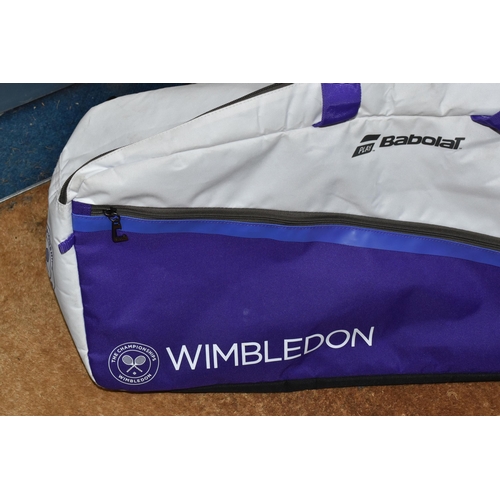 766 - A BABOLAT 'WIMBLEDON' TENNIS CHAMPIONSHIP SPORTS DUFFLE BAG, white and purple, can hold up to six te... 