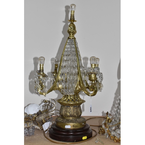 769 - A GROUP OF THREE CRYSTAL CHANDELIERS, possibly French, comprising two Regency style gilt metal ring ... 