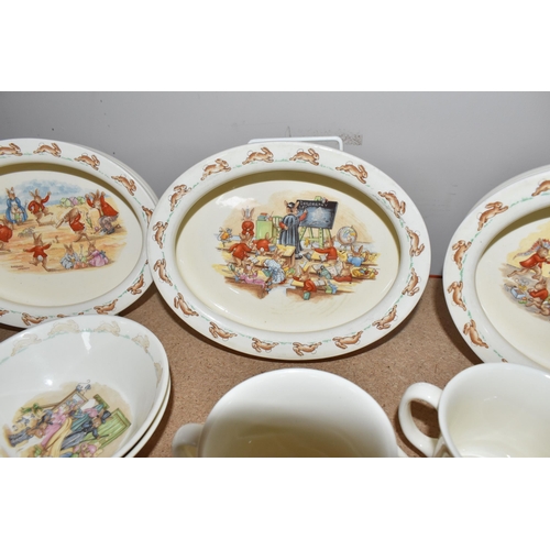 774 - A LARGE QUANTITY OF ROYAL DOULTON 'BUNNYKINS' DINNERWARE, comprising three oval nursery dishes with ... 