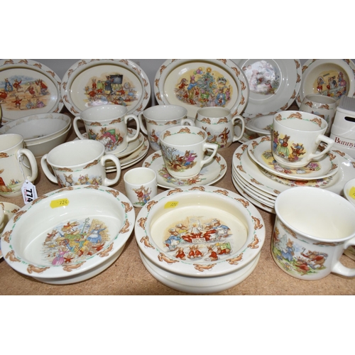 774 - A LARGE QUANTITY OF ROYAL DOULTON 'BUNNYKINS' DINNERWARE, comprising three oval nursery dishes with ... 