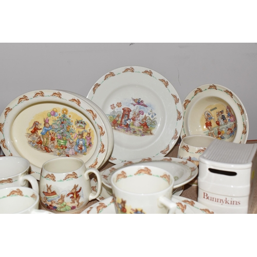 774 - A LARGE QUANTITY OF ROYAL DOULTON 'BUNNYKINS' DINNERWARE, comprising three oval nursery dishes with ... 