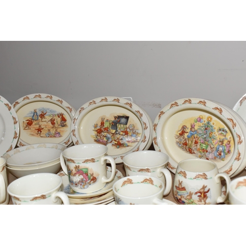 774 - A LARGE QUANTITY OF ROYAL DOULTON 'BUNNYKINS' DINNERWARE, comprising three oval nursery dishes with ... 