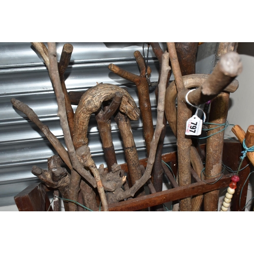 797 - A LARGE COLLECTION OF WALKING STICKS IN VARIOUS LEVELS OF COMPLETION to include a group of approxima... 