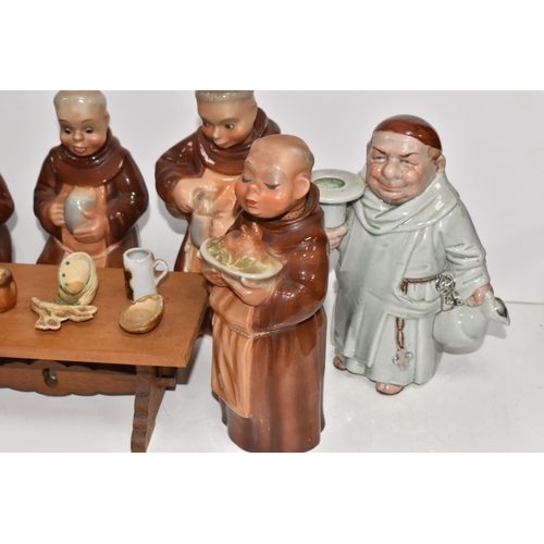 804 - A SET OF WEST GERMAN CORTENDORF DECANTERS MODELLED AS MONKS, the five monks holding tankards of mead... 