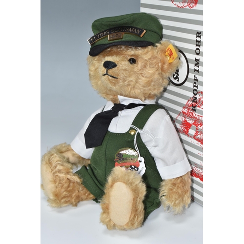 807 - A BOXED STEIFF ALWAYS BILL 'FLYING SCOTSMAN' TEDDY BEAR, no 664694, in golden mohair, wearing a trai... 