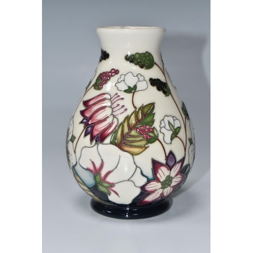 815 - A MOORCROFT POTTERY 'BRAMBLE REVISITED' BALUSTER VASE, tube-lined with a pattern of flowers and frui... 