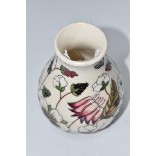 815 - A MOORCROFT POTTERY 'BRAMBLE REVISITED' BALUSTER VASE, tube-lined with a pattern of flowers and frui... 