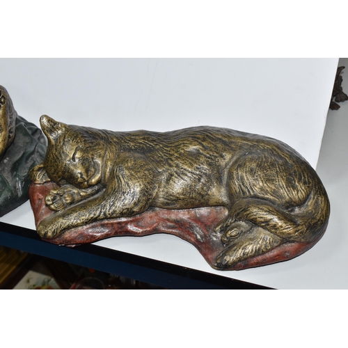 822 - TWO MODERN COMPOSITE CAT SCULPTURES to include a bronzed effect sleeping cat on a red blanket, heigh... 