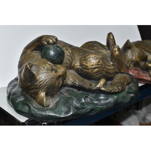 822 - TWO MODERN COMPOSITE CAT SCULPTURES to include a bronzed effect sleeping cat on a red blanket, heigh... 