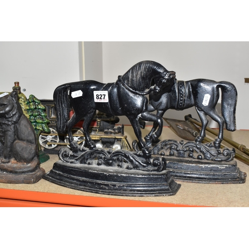 827 - A GROUP OF CAST IRON DOOR STOPS to include a pair of opposite facing black painted horses door stops... 