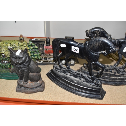 827 - A GROUP OF CAST IRON DOOR STOPS to include a pair of opposite facing black painted horses door stops... 