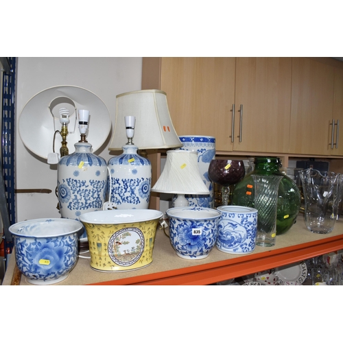 835 - A COLLECTION OF LARGE CERAMIC AND GLASS ITEMS to include three blue and white planters with floral d... 