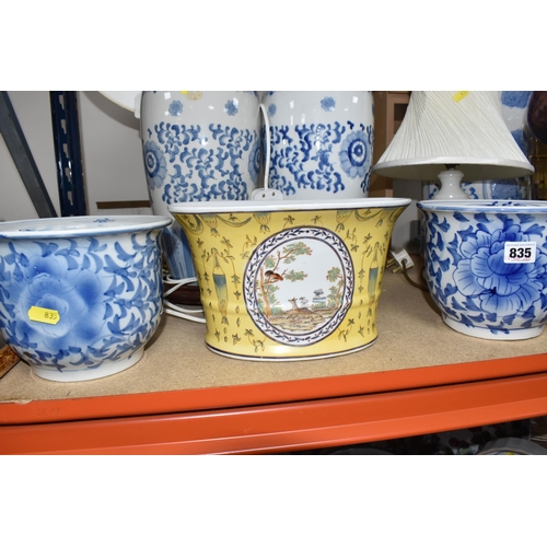 835 - A COLLECTION OF LARGE CERAMIC AND GLASS ITEMS to include three blue and white planters with floral d... 