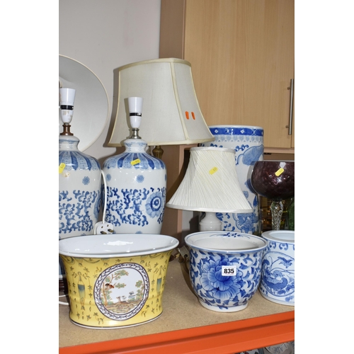 835 - A COLLECTION OF LARGE CERAMIC AND GLASS ITEMS to include three blue and white planters with floral d... 