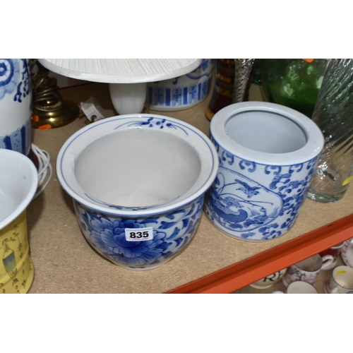 835 - A COLLECTION OF LARGE CERAMIC AND GLASS ITEMS to include three blue and white planters with floral d... 