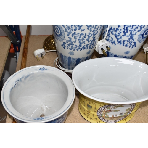 835 - A COLLECTION OF LARGE CERAMIC AND GLASS ITEMS to include three blue and white planters with floral d... 