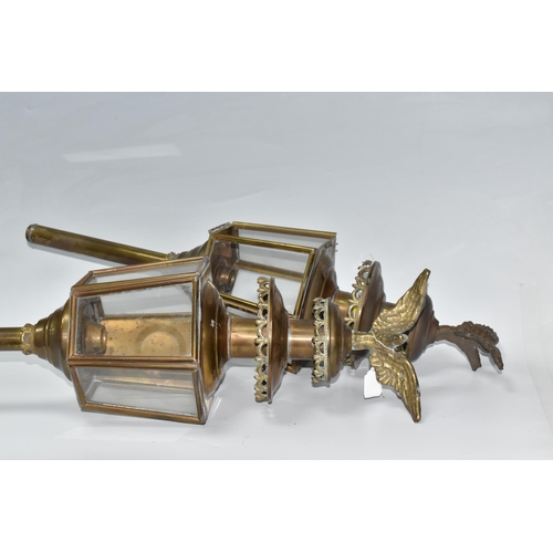 836 - A PAIR OF BRASS CARRIAGE LANTERNS both surmounted by eagles, height 74cm (2) (Condition Report: some... 