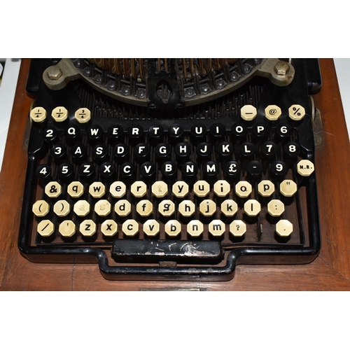 848 - A ROYAL BAR-LOCK TYPEWRITER, with black painted body, double upper and lowercase QWERTY keyboard and... 