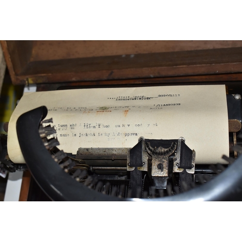 848 - A ROYAL BAR-LOCK TYPEWRITER, with black painted body, double upper and lowercase QWERTY keyboard and... 