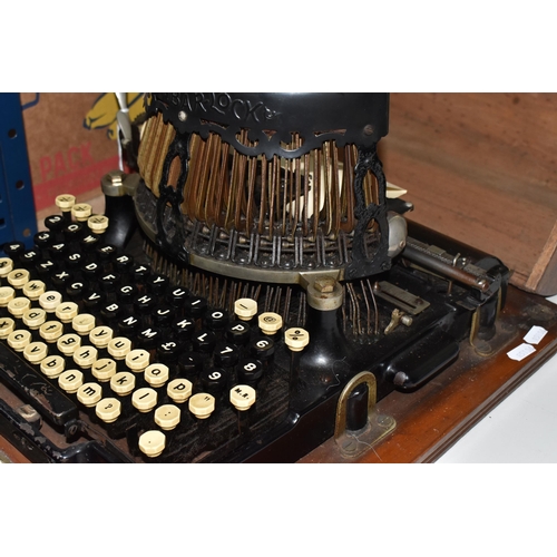 848 - A ROYAL BAR-LOCK TYPEWRITER, with black painted body, double upper and lowercase QWERTY keyboard and... 