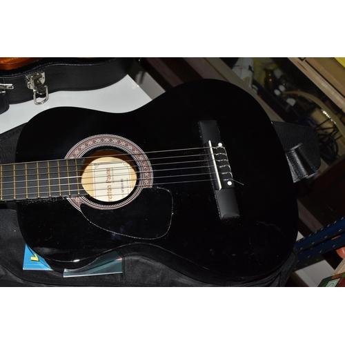 851 - A UKELELE AND A 3/4 SIZE LEFT-HANDED GUITAR, both have cases, comprising a Laka ukelele with built i... 