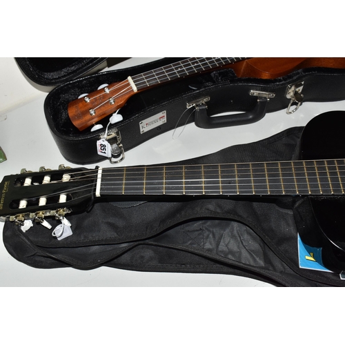 851 - A UKELELE AND A 3/4 SIZE LEFT-HANDED GUITAR, both have cases, comprising a Laka ukelele with built i... 