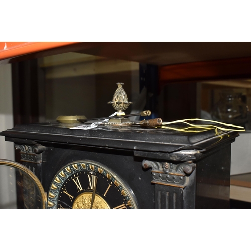 857 - A NINETEENTH CENTURY BLACK SLATE MANTEL CLOCK, of architectural form, with pineapple finial and othe... 