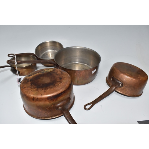 865 - A GROUP OF FIVE GRADUATING FRENCH COPPER COATED SAUCEPANS all with cast-iron handles, unmarked, larg... 