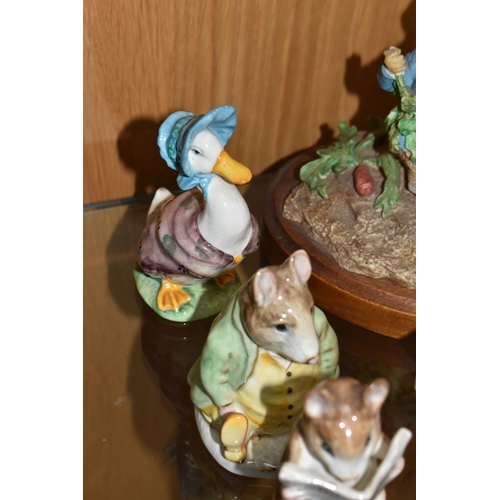 877 - A GROUP OF BESWICK BEATRIX POTTER FIGURES, comprising Flopsy, Mopsy and Cotton-Tail BP-2 backstamp (... 