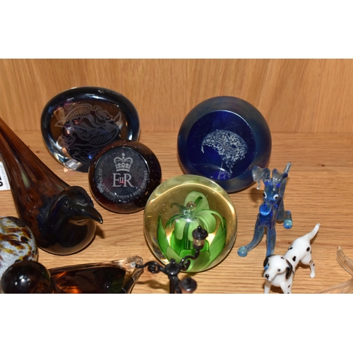 879 - A GROUP OF PAPERWEIGHTS AND DECORATIVE GLASS WARES, to include Caithness Mermaid Quartet and HM Quee... 