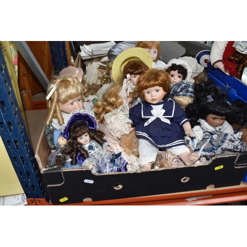 890 - THREE BOXES OF PORCELAIN HEADED ASSORTED DOLLS comprising approximately forty dolls in assorted peri... 