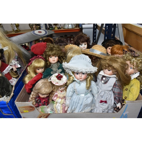 890 - THREE BOXES OF PORCELAIN HEADED ASSORTED DOLLS comprising approximately forty dolls in assorted peri... 