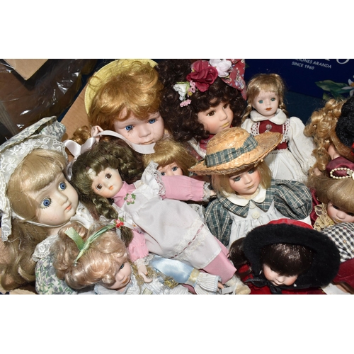 896 - TWO BOXES OF PORCELAIN DOLLS comprising approximately thirty assorted dolls in various period and tr... 