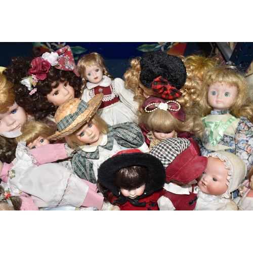 896 - TWO BOXES OF PORCELAIN DOLLS comprising approximately thirty assorted dolls in various period and tr... 