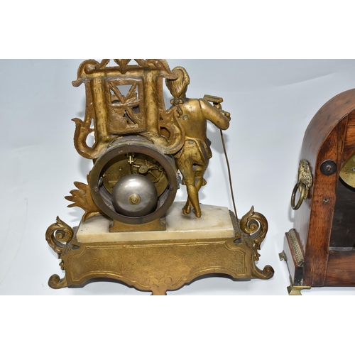 899 - TWO MANTEL CLOCKS AND A CUCKOO CLOCK, comprising a gilt French figural mantel clock, with a white po... 