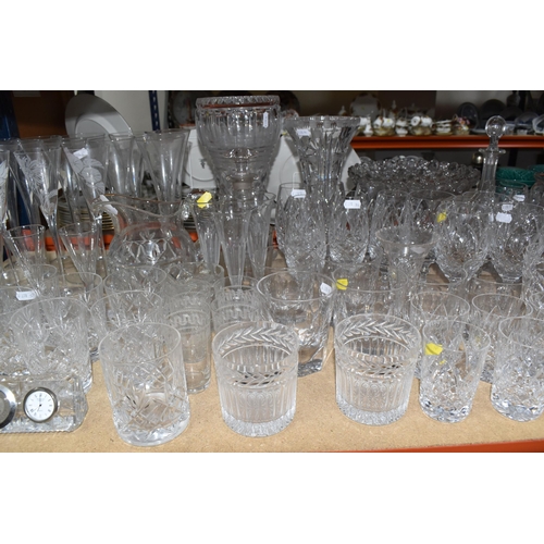 901 - A LARGE QUANTITY OF CUT GLASS, comprising a selection of various drinking glasses, vases, decanters ... 