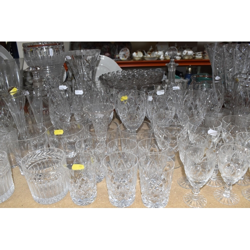 901 - A LARGE QUANTITY OF CUT GLASS, comprising a selection of various drinking glasses, vases, decanters ... 