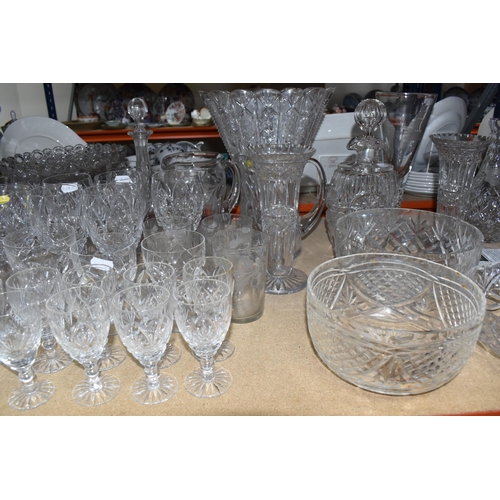 901 - A LARGE QUANTITY OF CUT GLASS, comprising a selection of various drinking glasses, vases, decanters ... 