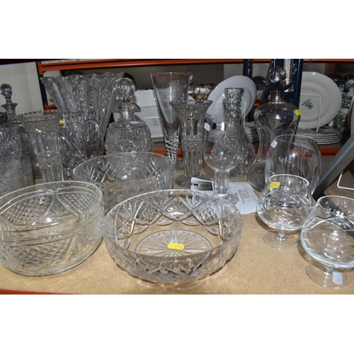 901 - A LARGE QUANTITY OF CUT GLASS, comprising a selection of various drinking glasses, vases, decanters ... 