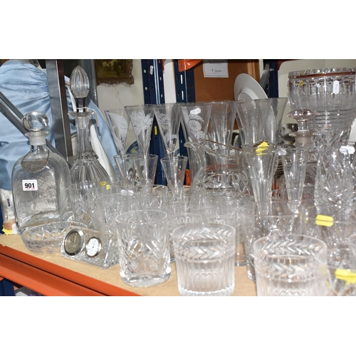 901 - A LARGE QUANTITY OF CUT GLASS, comprising a selection of various drinking glasses, vases, decanters ... 