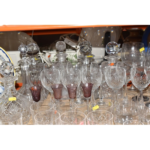 906 - A COLLECTION OF CUT GLASS ITEMS, comprising a selection of drinking glasses and decanters, to includ... 