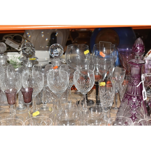 906 - A COLLECTION OF CUT GLASS ITEMS, comprising a selection of drinking glasses and decanters, to includ... 