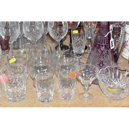 906 - A COLLECTION OF CUT GLASS ITEMS, comprising a selection of drinking glasses and decanters, to includ... 