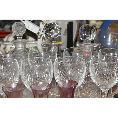 906 - A COLLECTION OF CUT GLASS ITEMS, comprising a selection of drinking glasses and decanters, to includ... 