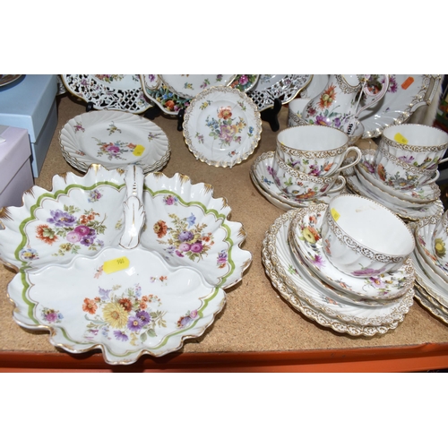 908 - A GROUP OF HAND-PAINTED DRESDEN TEA WARE, hand painted with various floral designs and gilt pattern ... 