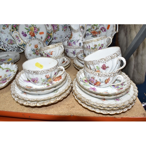 908 - A GROUP OF HAND-PAINTED DRESDEN TEA WARE, hand painted with various floral designs and gilt pattern ... 