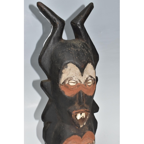 920 - A LEGA 'SAKIMATWEMATWE' MULTI-FACED SCULPTURE, DEMOCRATIC REPUBLIC OF CONGO depicting a local multi-... 