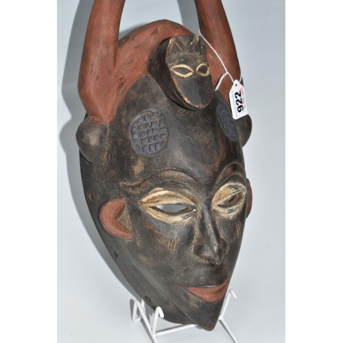 922 - A PUNE TRIBAL MASK, GABON with naturally pigmented horns with an anthropomorphic crest to the forehe... 